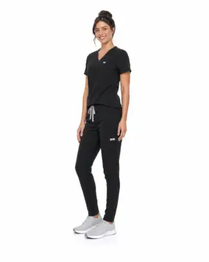 Black Scrub Set worn by woman walking, side profile