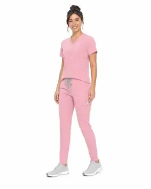 Women's pink scrubs three-quarter view, woman walking